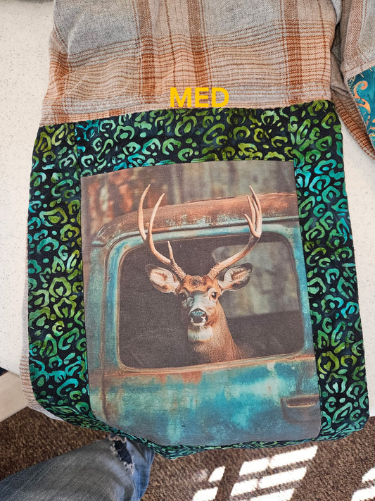 Stinkin’ Cute Deer in Truck